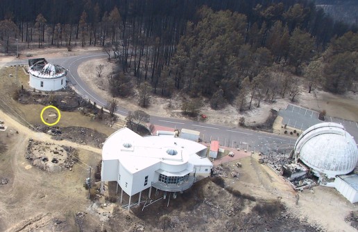 Destroyed telescopes and surviving Visitor Center (photo Jason Phillips)